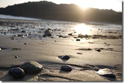 Pebble covered beach at Mumbles, Wales