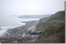 Walking over headlands on Gower Peninnsula near Mumbles, Wales