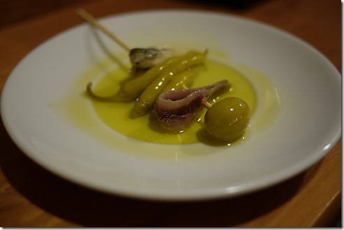 Peppers, anchovies and olives - tapas -  Spain food